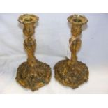 A pair of mid 19th century gilt bronze candlestick