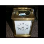 A 13cm brass cased repeater carriage clock with wh