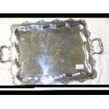 A 40cm x 30cm Mexican silver two handled tray with