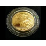 An Elizabeth II Royal Mint gold sovereign coin in