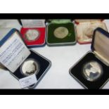 Five various cased Elizabeth II Silver Crown Coins