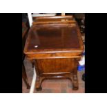 A Victorian walnut Davenport desk with drawers to