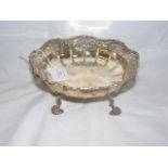 A 20cm diameter silver footed bowl with pierced ri