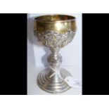 An interesting silver gilt wine goblet with applie