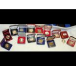 A collection of 14 Royal Mint and other cased silv