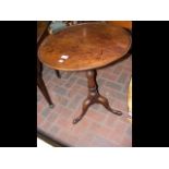 Circular antique snap-top table