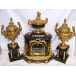 An attractive antique French three-piece clock set