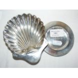 A silver shell dish, together with a small silver