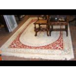 Indian carpet with floral centre medallion - 300cm x 190cm