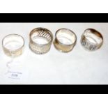 Four silver napkin rings