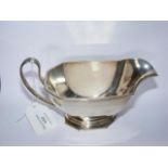 Heavy silver sauce boat with Birmingham hallmark