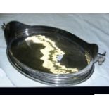 Plated serving tray with deep gallery and cast hor
