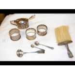 Silver napkin rings, mustard pot, etc.