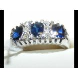 A sapphire and diamond ring in 18ct white gold set