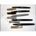 A Pelikan fountain pen, together with four Parker