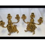 A pair of Rococo ormolu 19th century candelabra wi