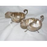 A pair of silver sauce boats