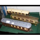 Three Hornby O gauge tinplate carriages