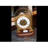 A 28cm high decorative gilt mantel clock with visi