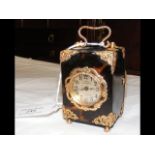 An Asprey of London miniature carriage clock with