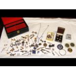 Various collectable badges, cuff links