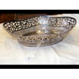 A decorative pierced silver basket - 31cm lon