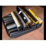 A tray containing various model railway carriages,