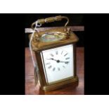 A French brass cased carriage clock - 12cm high