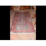 An antique Middle Eastern rug