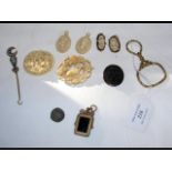 A chamber stick, brooches, etc.