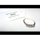 A five stone diamond ring in gold setting