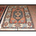 A Turkish woollen "Sultanhan" rug - 192cm x 135cm