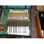An early Hohner Student III piano accordion