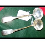 A pair of silver ladles