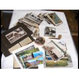 Various collectables, including postcards, coins