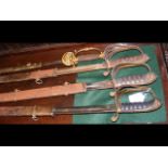 Three Officer's swords with metal scabbards, toget