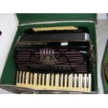 A Sottimio piano accordion in carrying case
