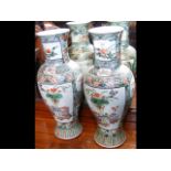 A pair of Famille Verte baluster vases - 36cm high