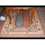 A Persian woollen "Wiss" rug - 217cm x 142cm