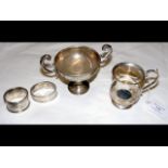A two handled silver trophy, tankard, together wit