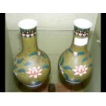 A pair of antique oriental vases with signature an