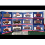 Boxed Bachmann rolling stock, including open wagon