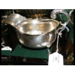 A silver sauce boat with Chester hallmark