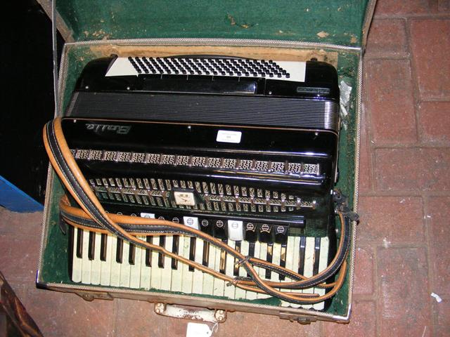 A Baile Superchampion piano accordion in carrying