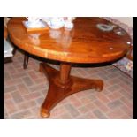 A 106cm diameter mahogany breakfast table
