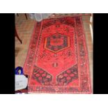 An antique Persian "Khamsseh" woollen rug - 185cm
