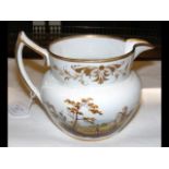 An antique jug with hand painted floral an