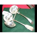 Three silver sauce ladles