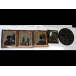 Four daguerreotypes, together with a plaque