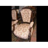 A Victorian gentleman's armchair with button back